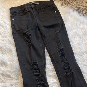Size 00 Express Dark wash Super Distressed skinny jeans